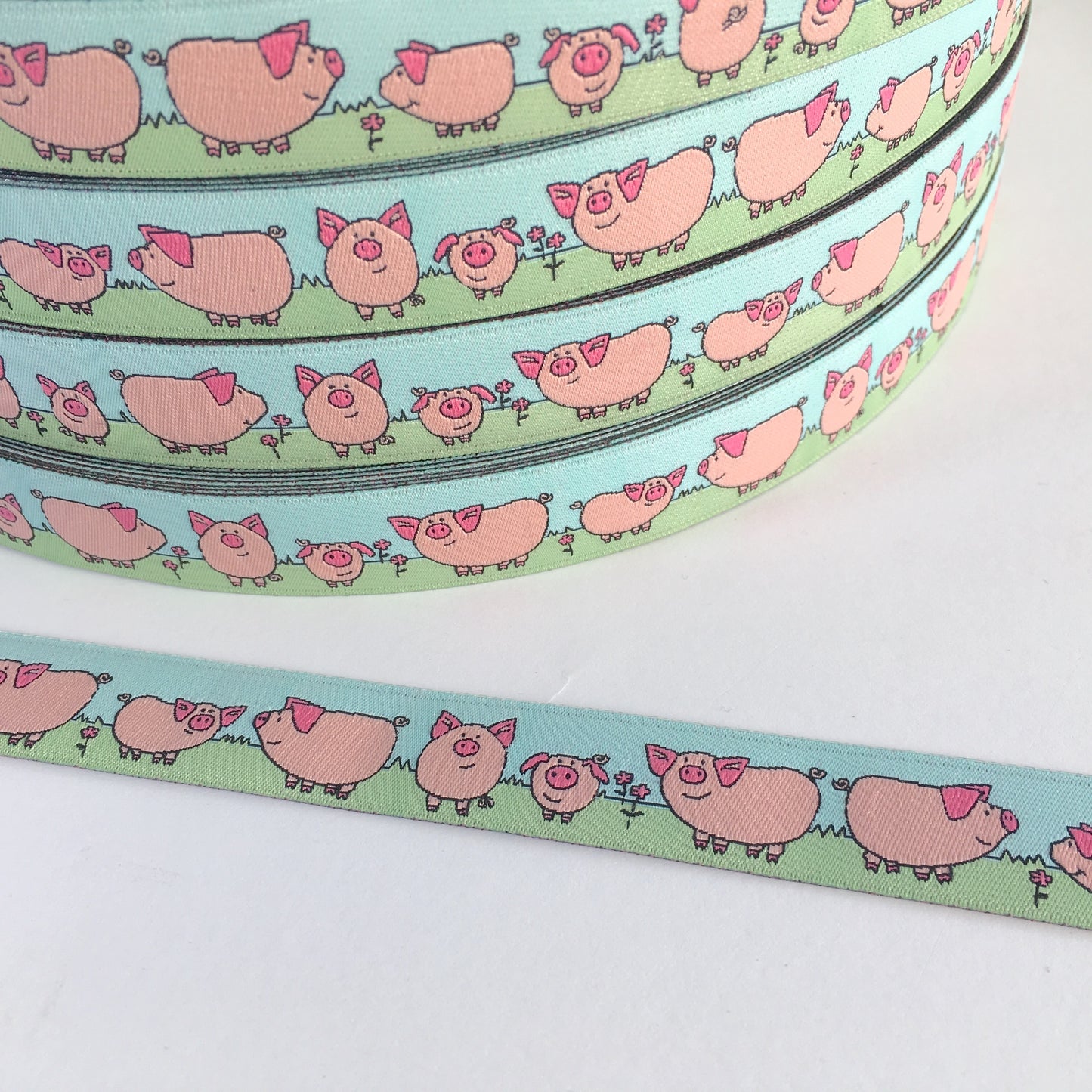 Webband Glücksschweinchen rosa/grün/bleu