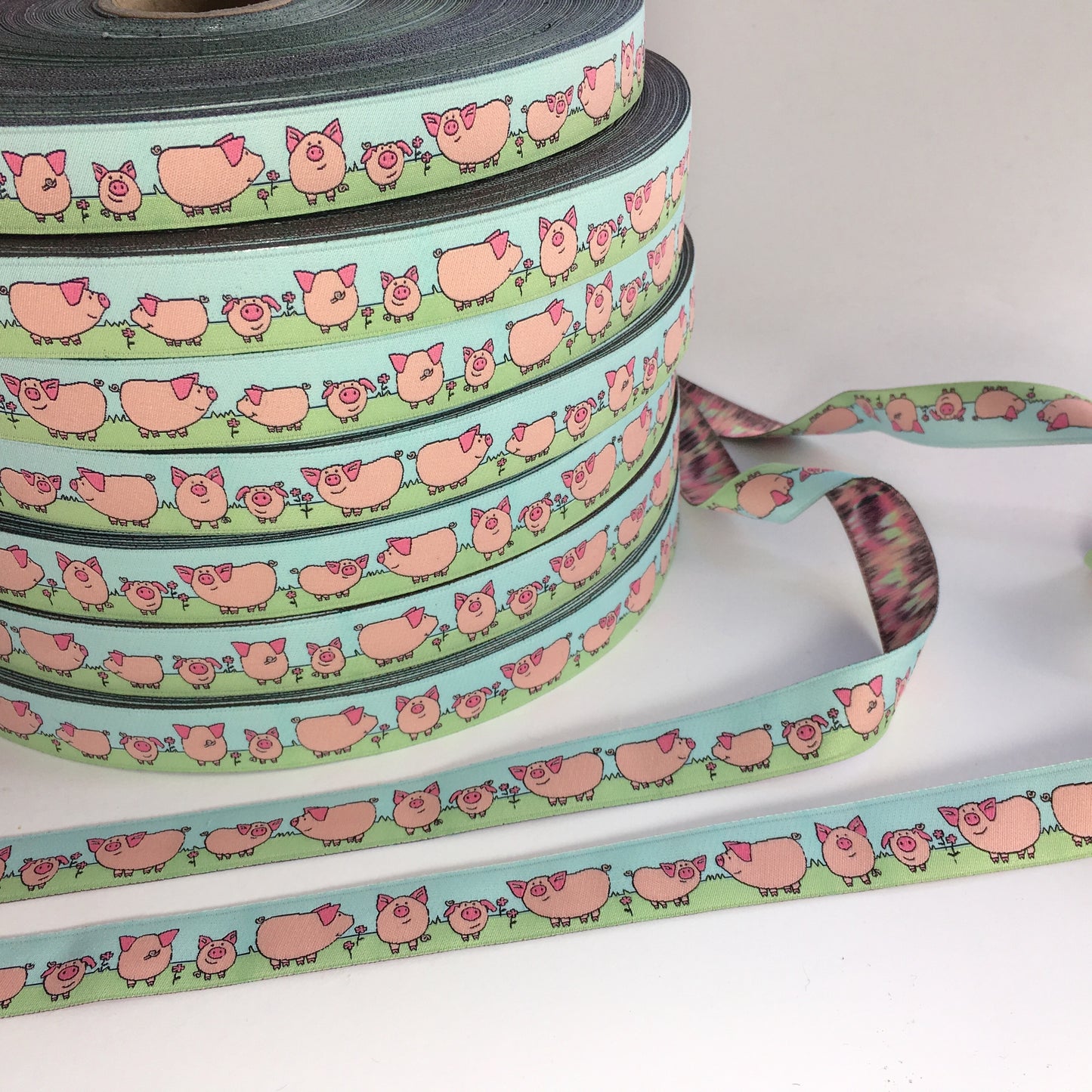 Webband Glücksschweinchen rosa/grün/bleu